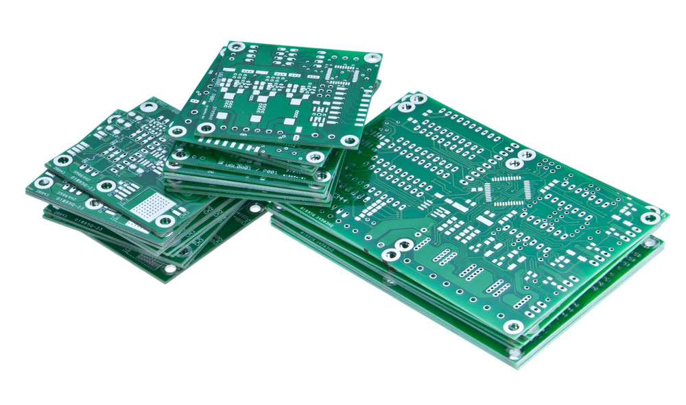 Heap of PCBs isolated on white
